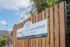 The main school sign says 'a place for all to flourish'  