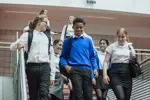 A group of secondary school students walking. 