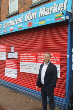 Councillor Stoll outside Bucharest Mini Market, Sutton in Ashfield