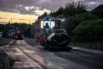 Heavy machinery working on a road in Mansfield at night