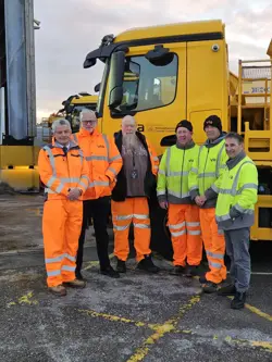 County Council gritting team with gritting lorry on site at Gamston