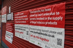 Closure signs on Bucharest Mini Market, Sutton in Ashfield
