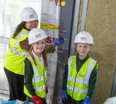 Headteacher Bernadette Hunter is pictured with pupils Emilia Lapok, aged nine, and Bobby Timmermans aged eight.