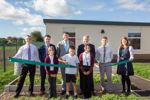 Nottinghamshire county councillors with staff and pupils from Leen Mills Primary School in Hucknall.