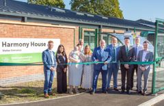 Image shows the council leader Mick Barton about to cut the ribbon to mark the opening of the building 