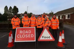 Volunteers from the Colwick Community Flood Signage scheme with Councillor Bert Bingham